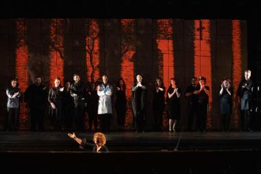 The cast of OURLAND with Barbara Day Turner conducting