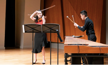 The Colburn School Contemporary Ensemble students perform on stage.