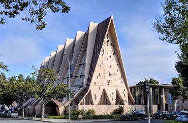 Exterior photo of First United Methodist Church, 625 Hamilton Ave. at Webster showing the iconic design of this mid-century concrete structure.