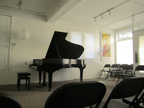 The interior; note acoustics-enhancing folding chairs 