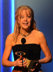 Maria Schneider accepts her Grammy Award on Sunday Photo by Frederic J. Brown/AFP