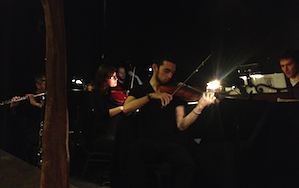 Single-instrument "violin section" Lucas Gayda in front, music director David Moschler on the right, violist Christina Lesicko behind Gayda Photo by Jason Hoover