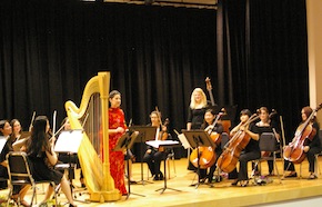 Guest harp soloist Anna Maria Mendieta  Photo by Jeanette Tietze