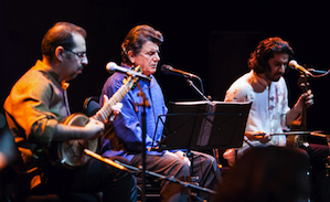 Sharjarian in performance, with Tahmoures (left) and Sohrab (right), the Pournazeri brothers Photo by Masud Harati 