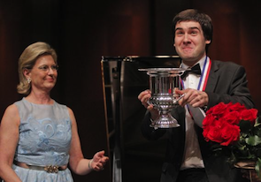 Cliburn Chairman Carla Thompson presents the gold medal and winner's cup to Kholodenko last year Photo by Ron T. Ennis/Fort Worth Star-Telegram 