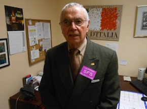 Horacio Rodriguez, Davies Hall head usher (since 1980), wearing the sticker seen everywhere Friday night 