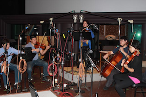 Ann Moss (center) with the Hausmann Quartet, on the sound stage at Skywalker Ranch. Photo by Jeff Kaliss