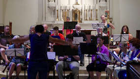 Rotem Gilbert conducts a rehearsal at the beginning of a busy week Photo by Hanneke van Proosdij