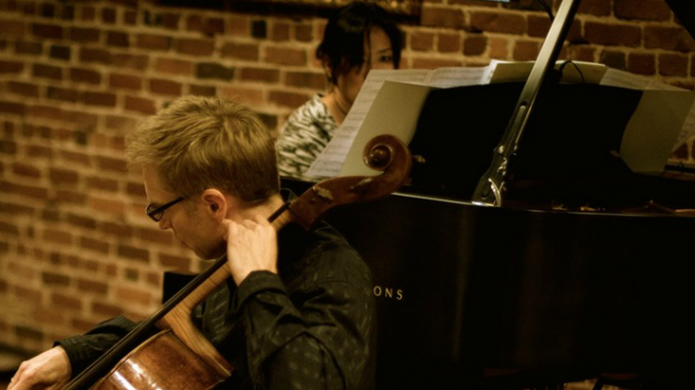 B3LLA Trio cellist Eric Gaenslen and pianist Mimi Lee performing.