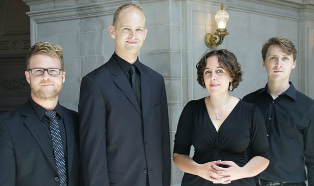  Four of the Gaude Ensemble: music director Jace Wittig, baritone Matthew Peterson, soprano Elizabeth Kimble, tenor Samuel Faustine (Photo by Adam Ward)