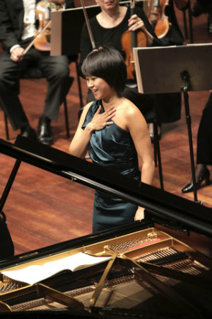 Yuja Wang receives applause in Edinburgh; there and in London, she was featured in the Beethoven Piano Concerto No. 4 and Bartok's Piano Concerto No. 2