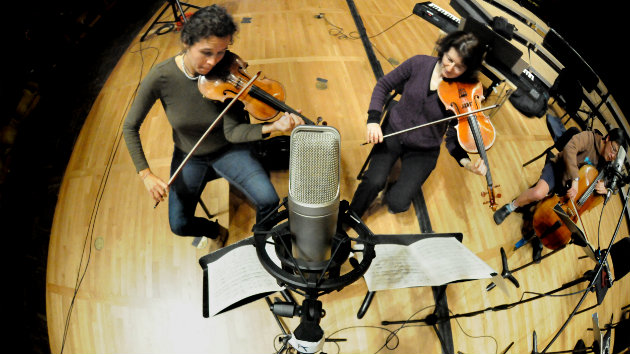 eco ensemble in a performance of Kaija Saariaho's <em>Notes on Light</em> (Photo courtesy of Cal Performances)