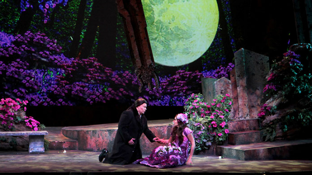 Faust (James Callon) and Marguerite (Elizabeth Zharoff) in Marguerite's garden.