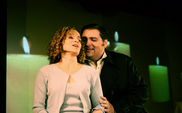 Gilda (Eileen Meredith) being seduced by the Duke of Mantua (Alex Boyer)  (Photo by Craig Merrill)